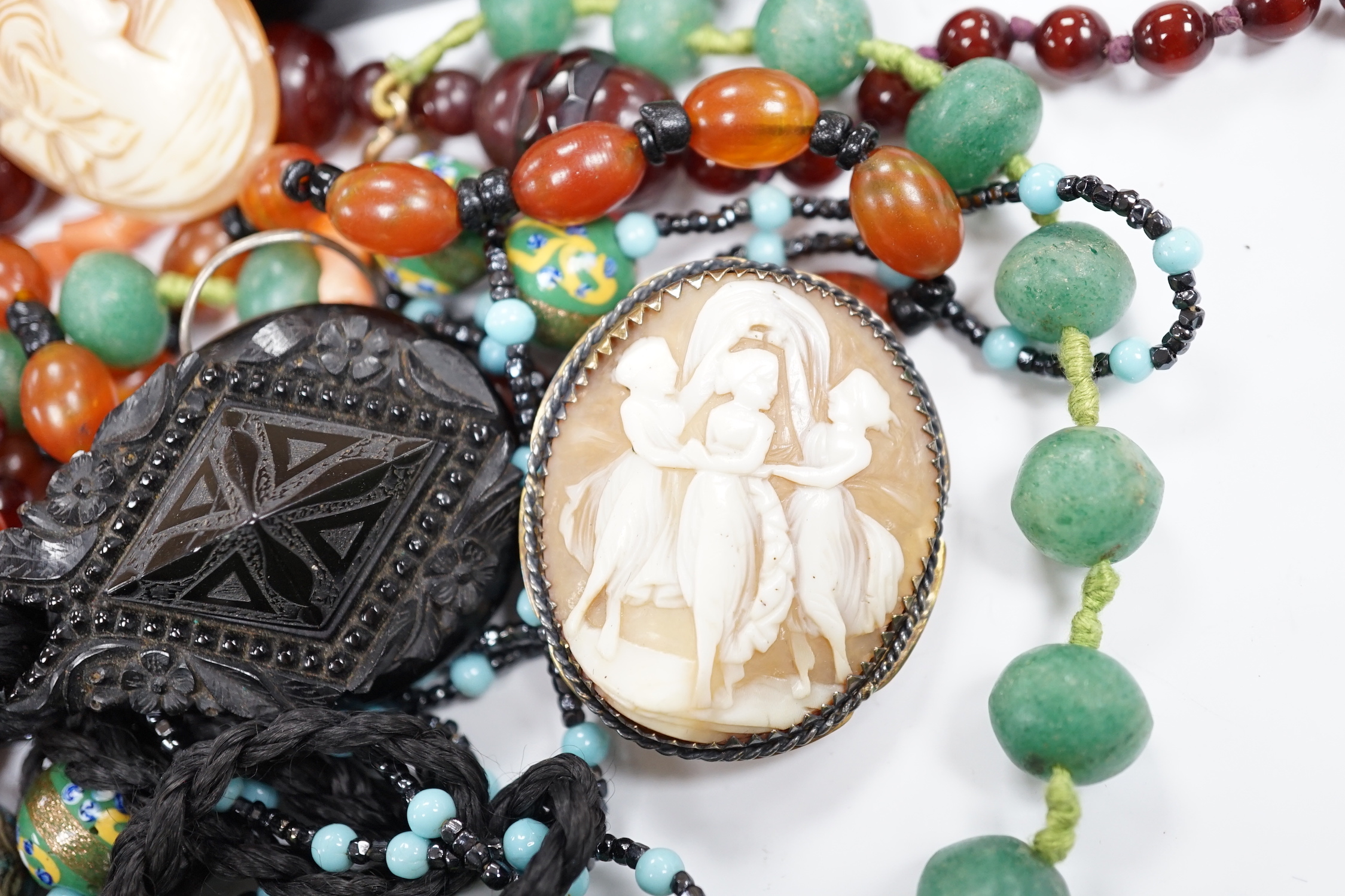 A group of assorted antique and later jewellery, including costume, paste set bracelet, gold plated albert, cameo shell brooch, micro mosaic brooch, silver and enamelled butterfly brooch, etc.